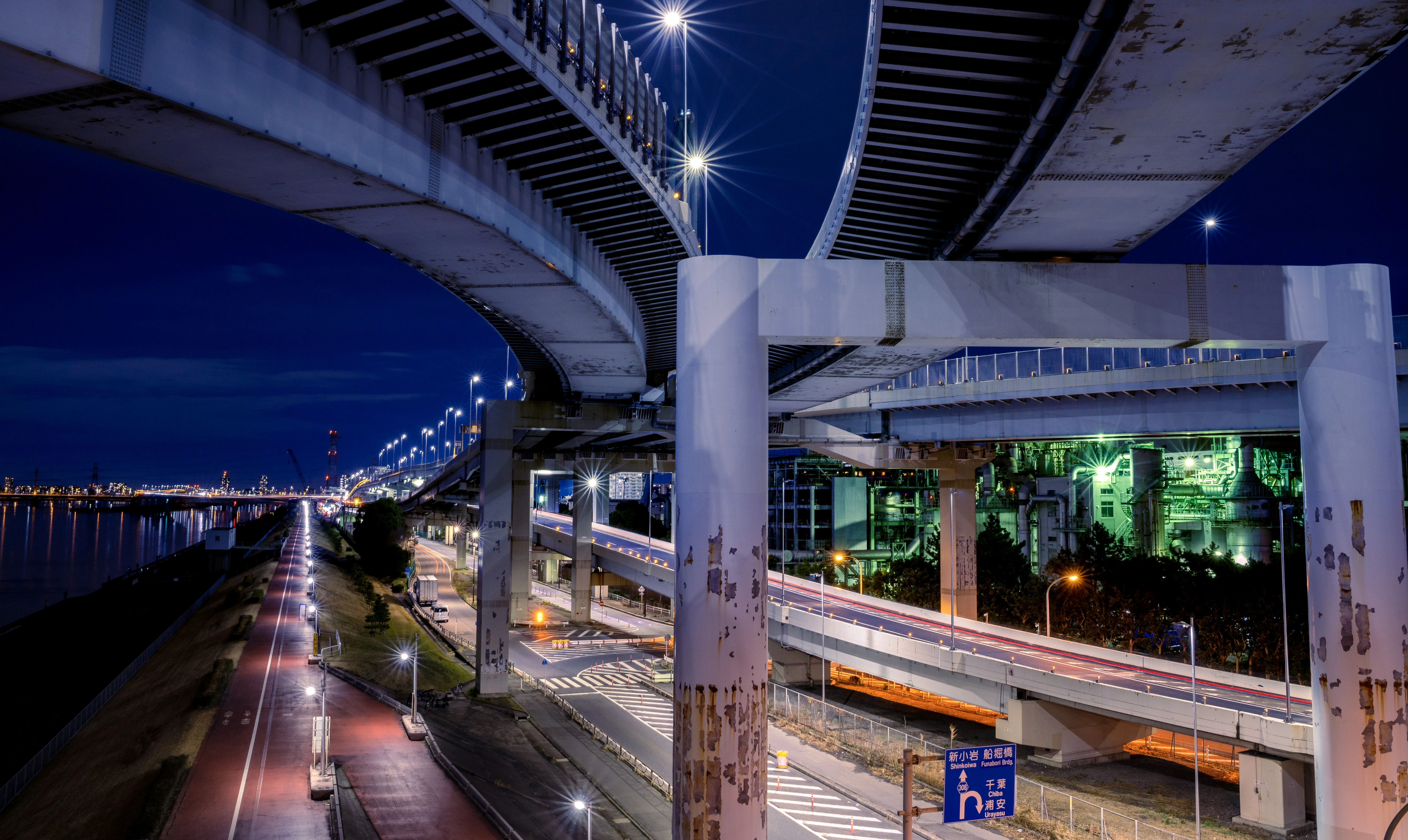 Illuminated City Overpasses Under the Night Sky
